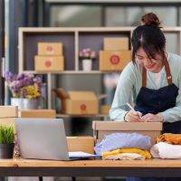 portrait-asian-woman-ecommerce-employee-freelance-with-parcel-box-deliver-customer-online-marketing-packing-box-delivery-concept